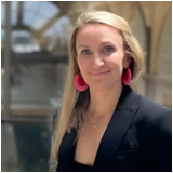 Photo of Erin Guill, President & COO, Auxilius