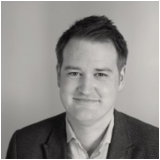 Photo of Brian Sharkey, VP Global Solution Engineering, Teckro